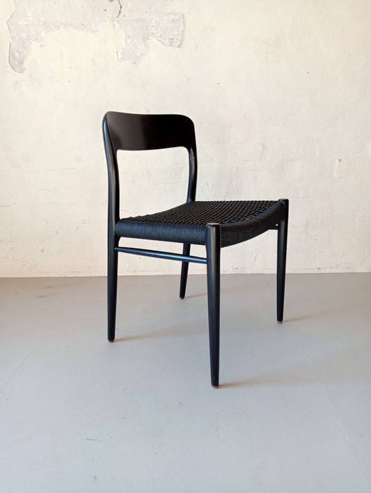 Niels O. Møller model 75 armchair. Set of four in black glazed wood.