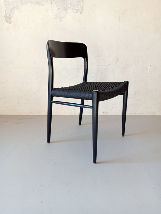 Niels O. Møller model 75 armchair. Set of four in black glazed wood.