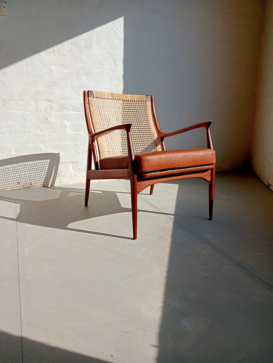 Rattan and teak lounge chair by Erik Andersen & Palle Pedersen for Horsnaes Møbler